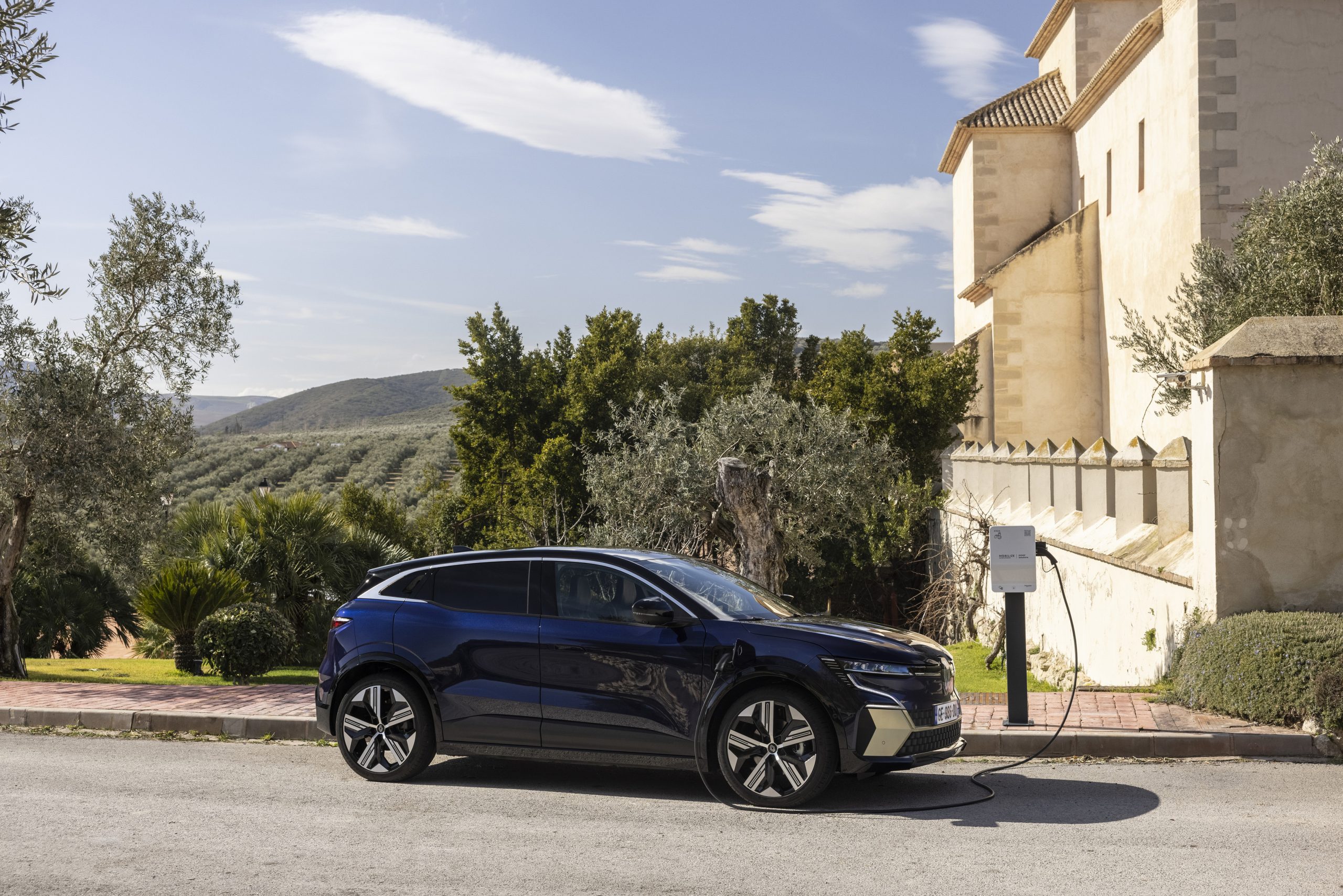 megane electric blauw zijkant